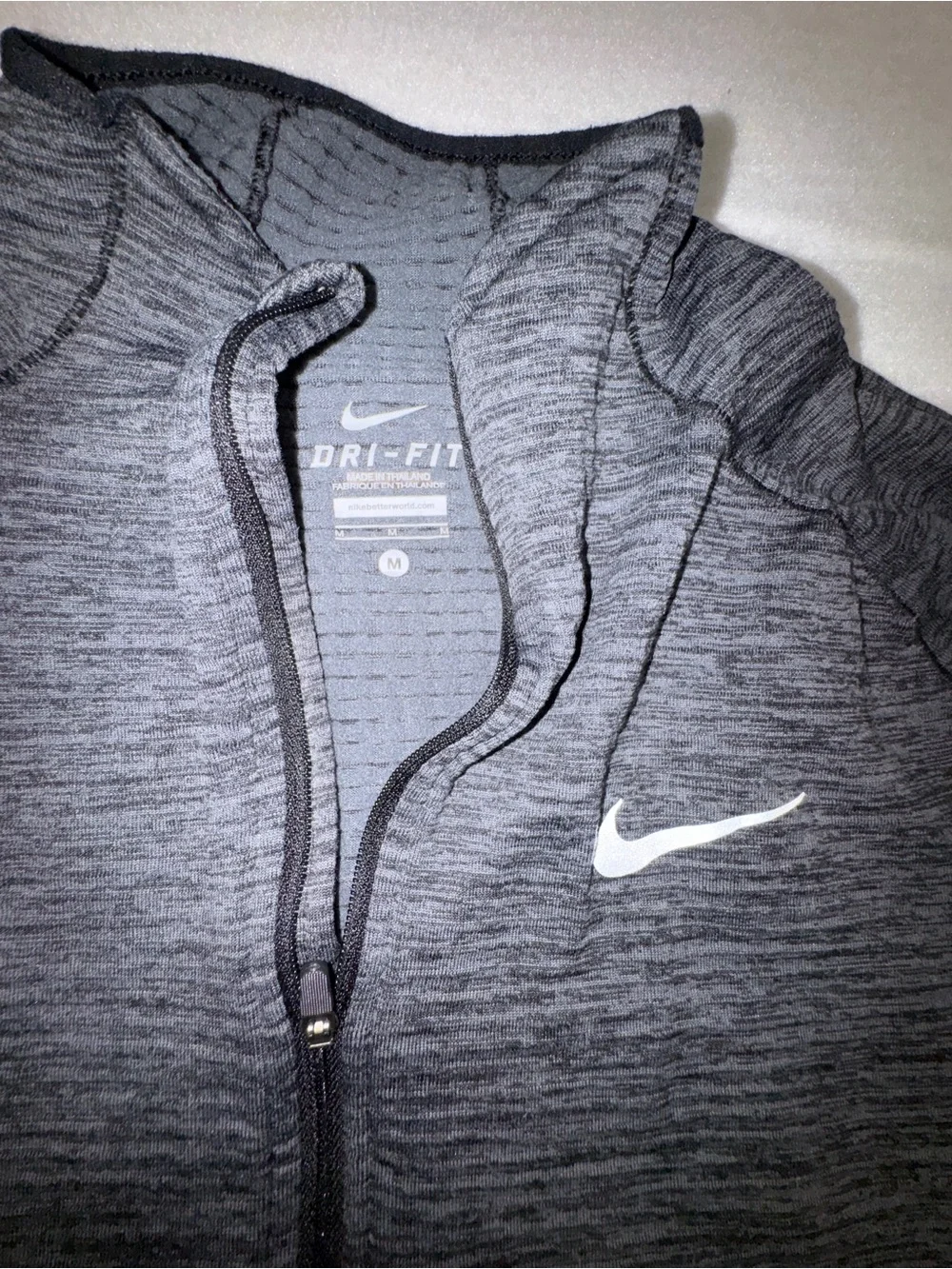 Nike women's Black Heather Quarter-Zip Performance Jacket